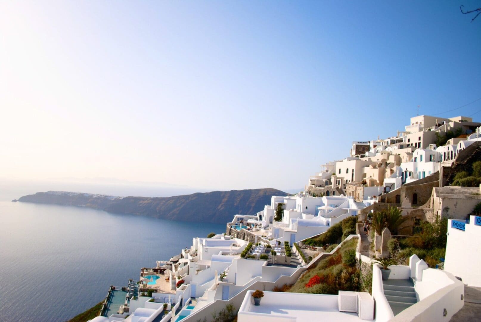 A coastal town under a blue sky